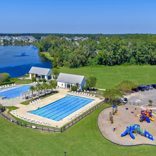 Two pools and playground near lake