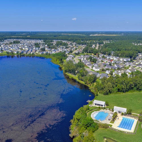 Two pools, open-air pavilion, playground, and lake access